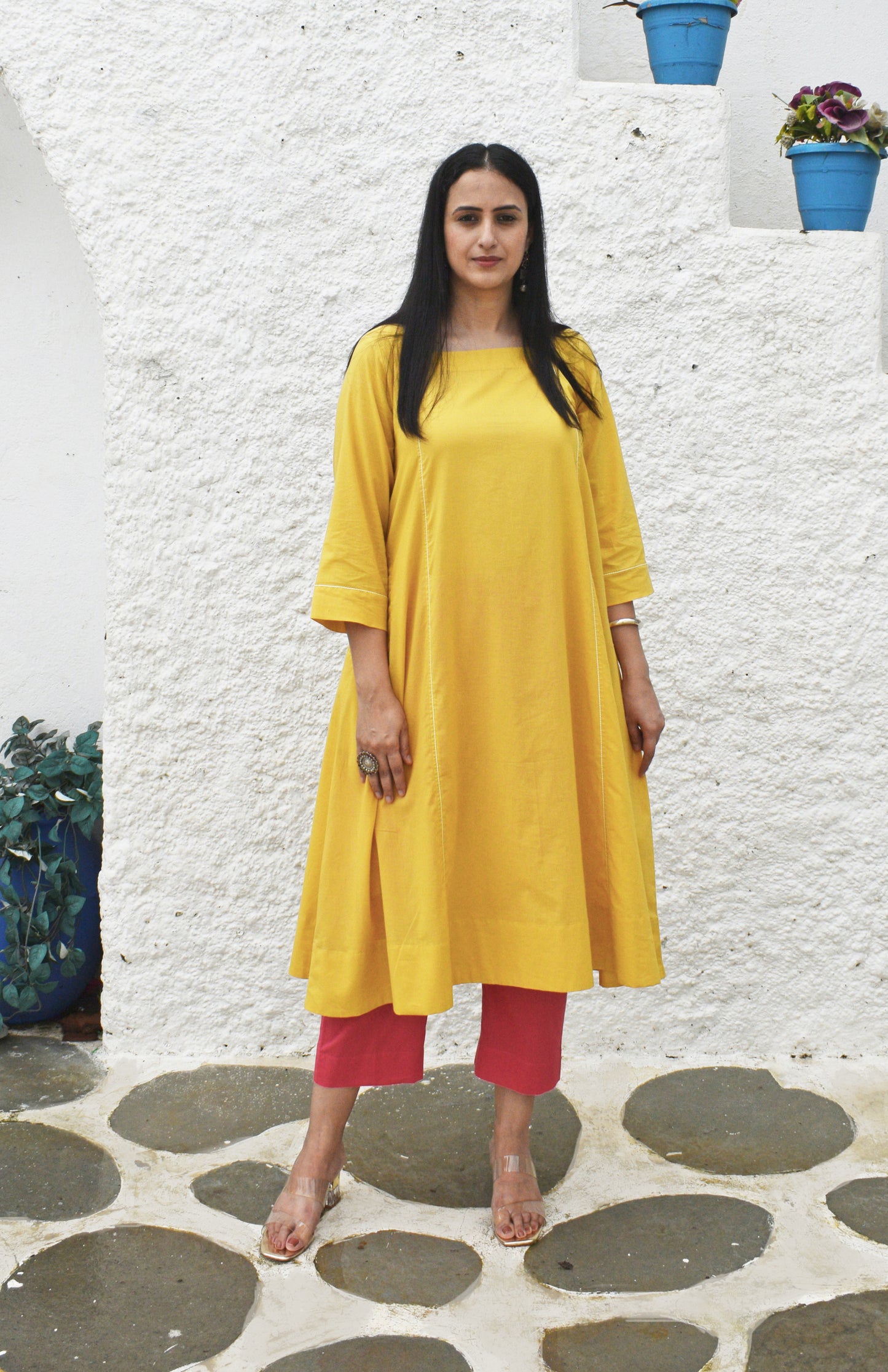 Yellow Flared Cotton Kurta with square neck and pink pyjama