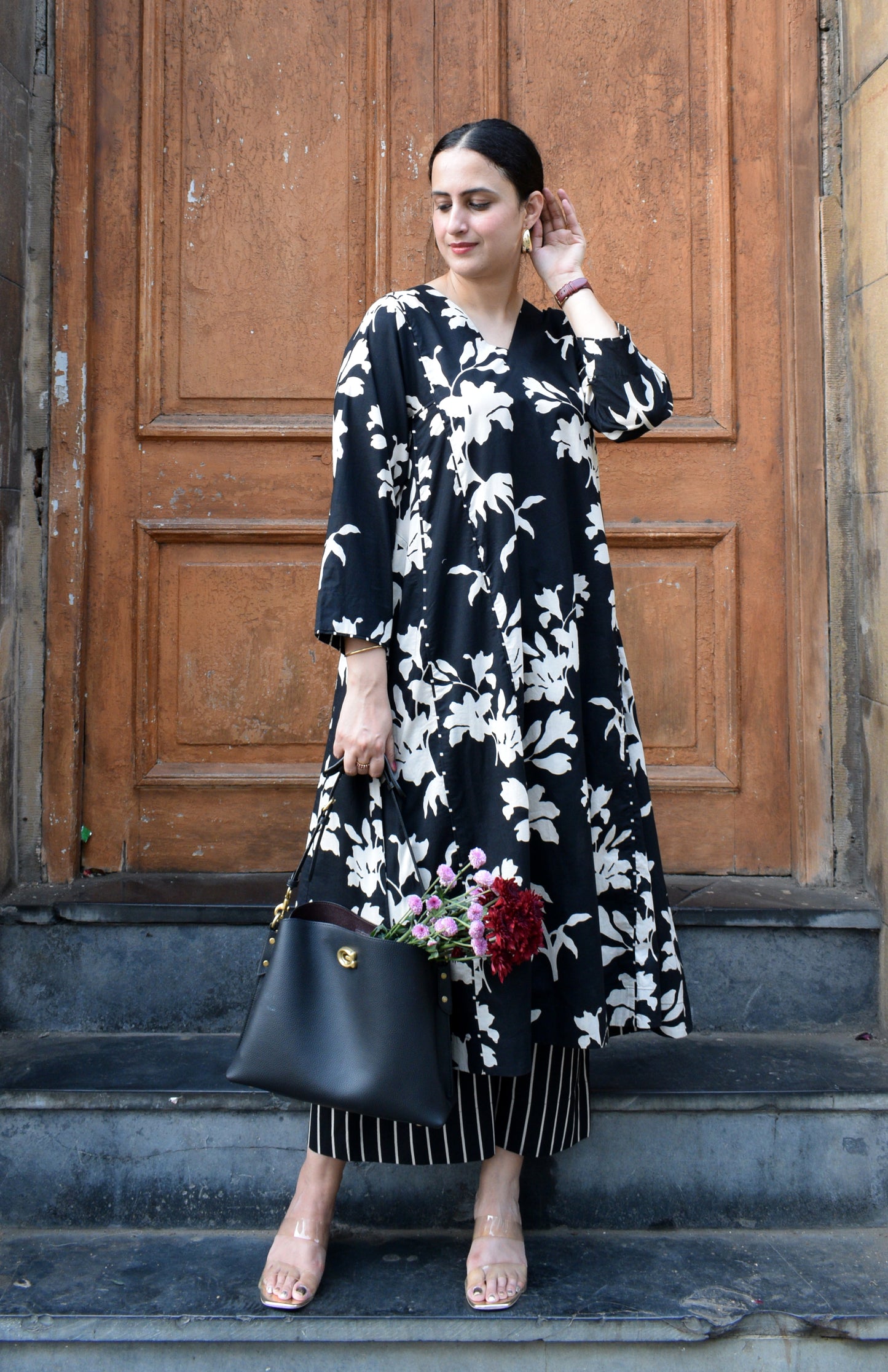 Black floral kurta set with striped pajama