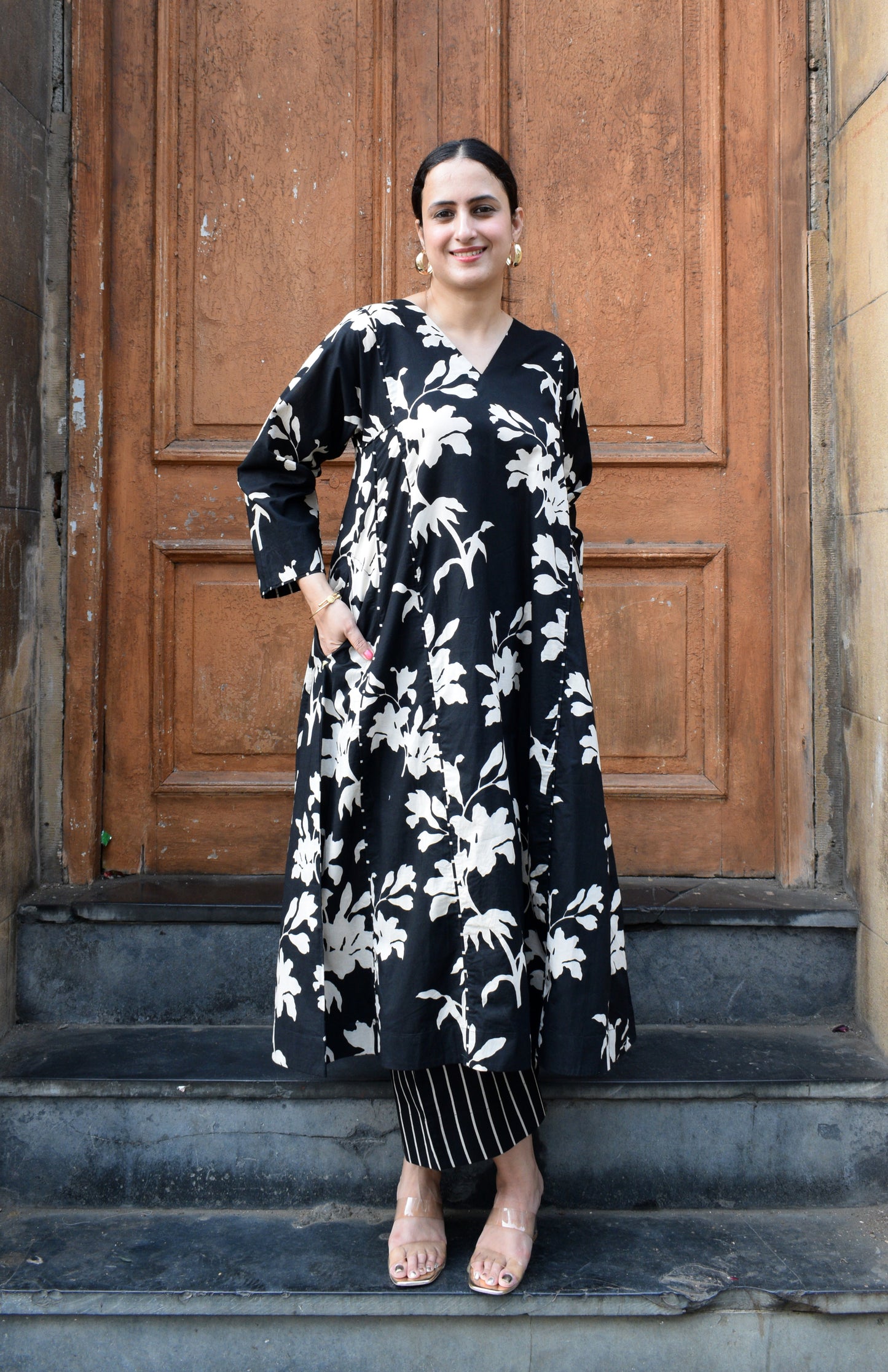 Black floral kurta set with striped pajama