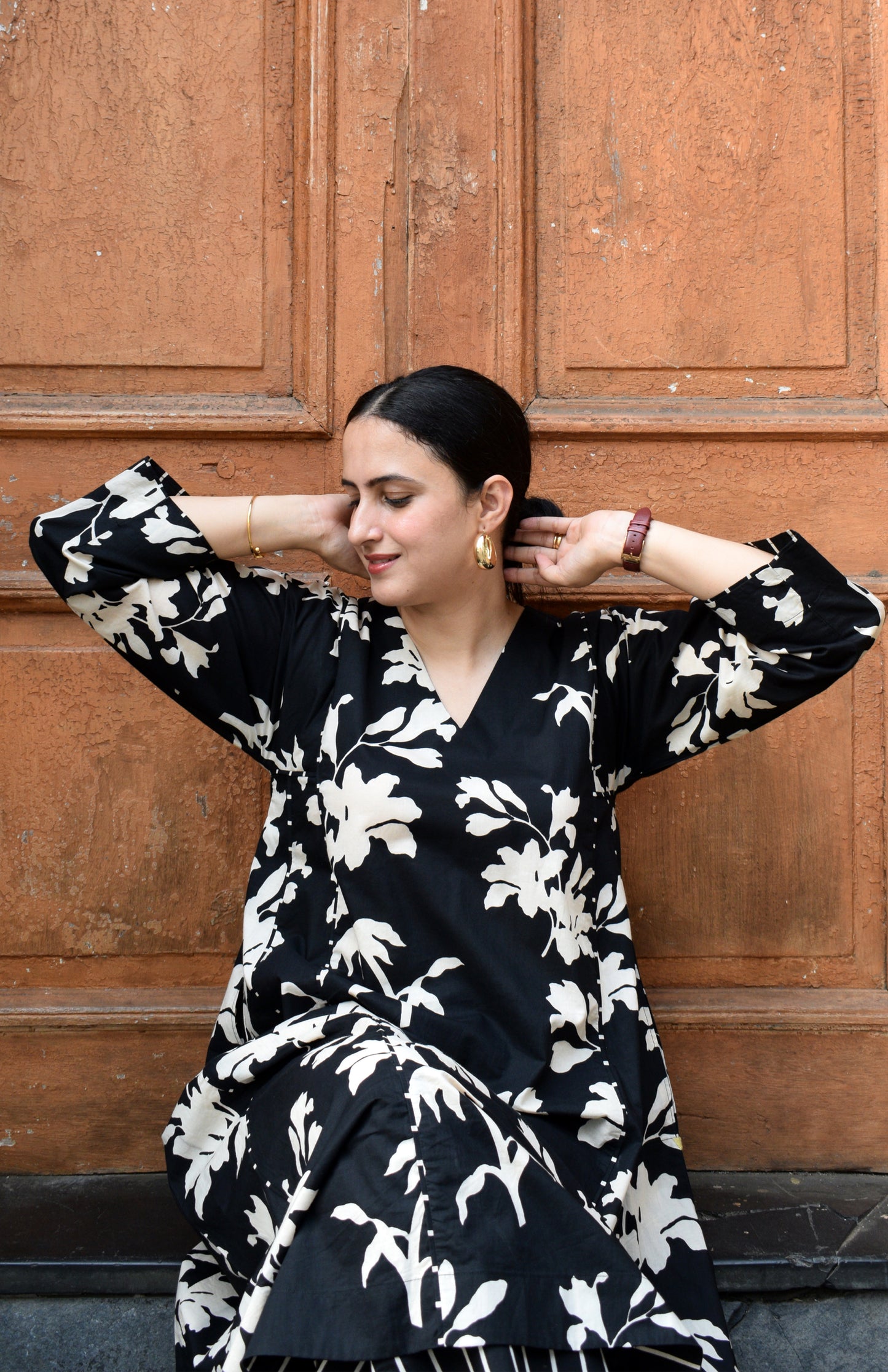 Black floral kurta set with striped pajama