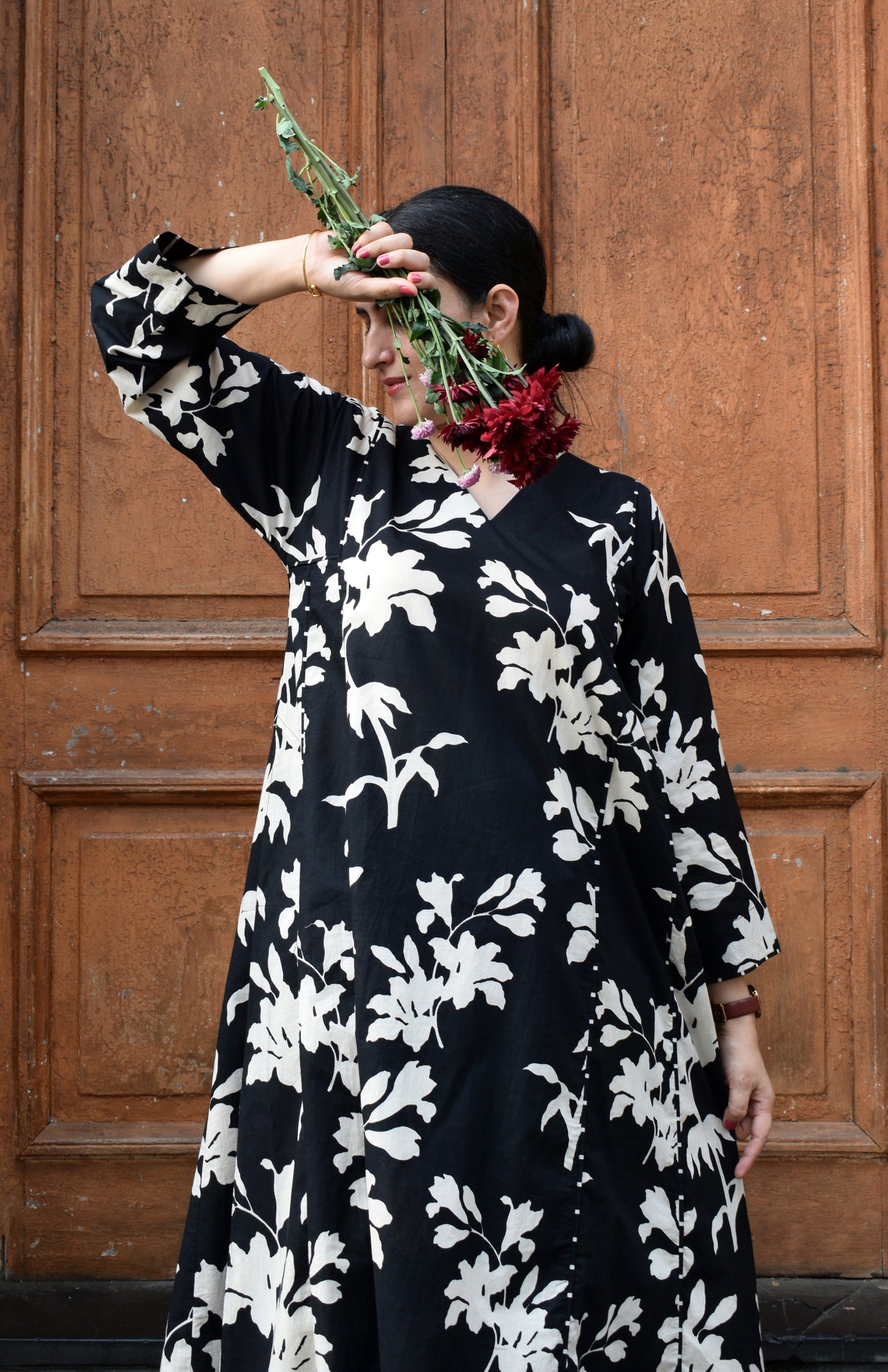 Black floral kurta set with striped pajama