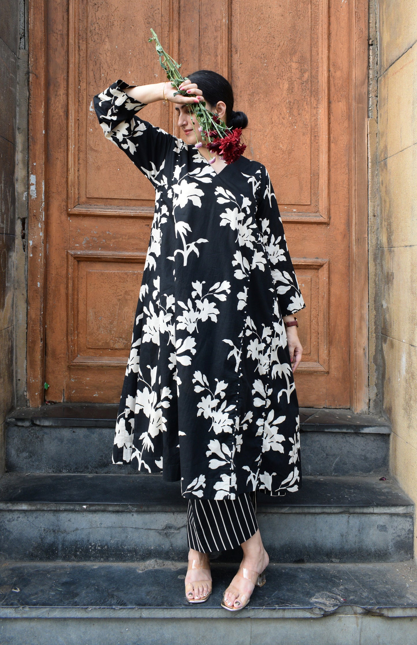 Black floral kurta set with striped pajama