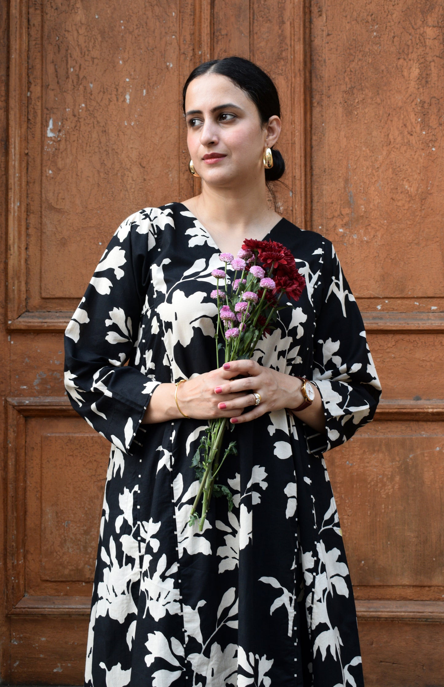 Black floral kurta set with striped pajama