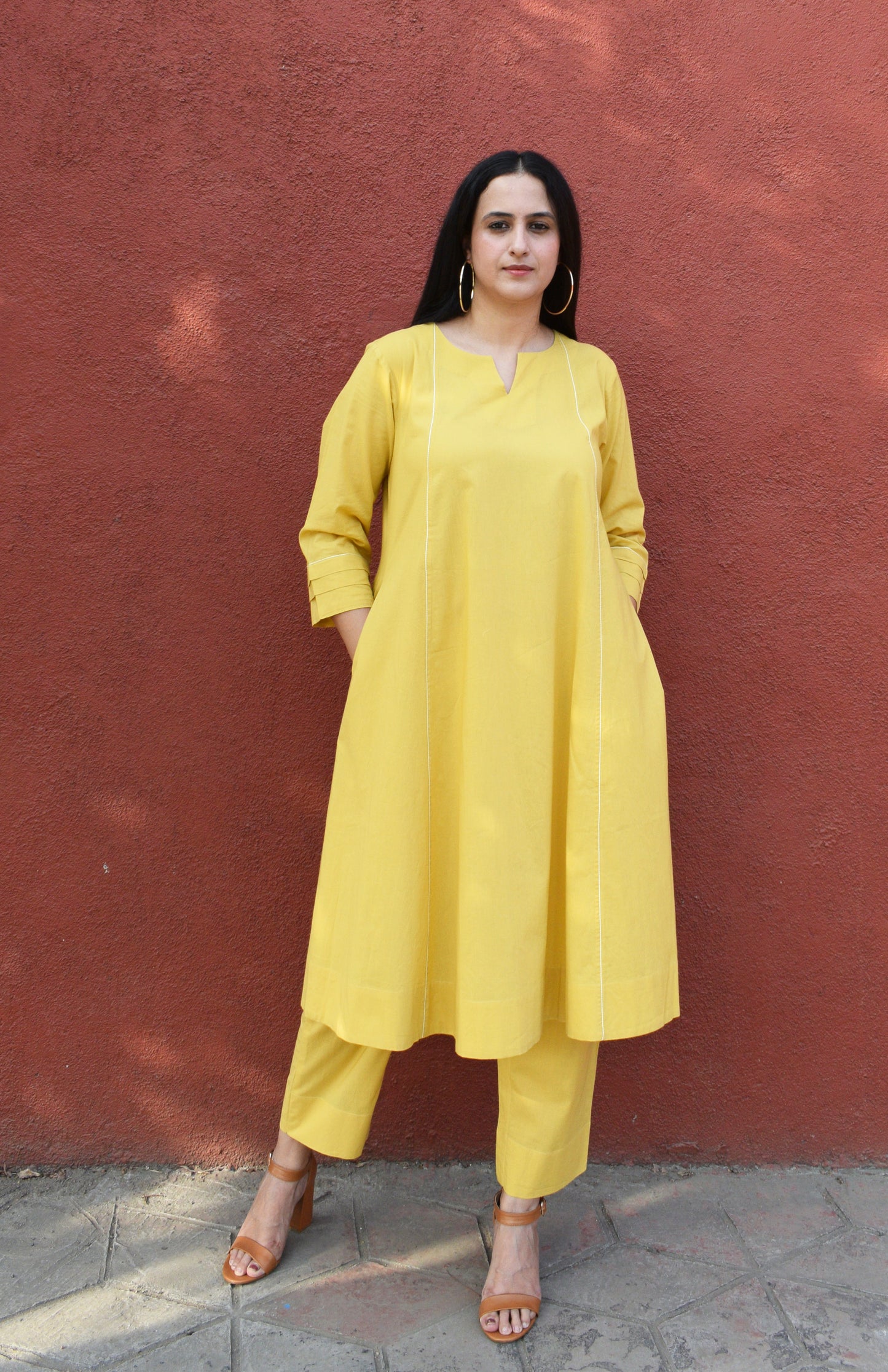 Yellow A line cotton kurta with panels