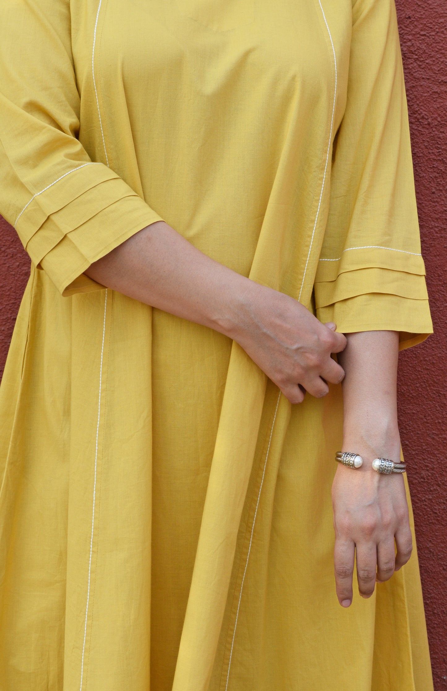 Yellow A line cotton kurta with panels