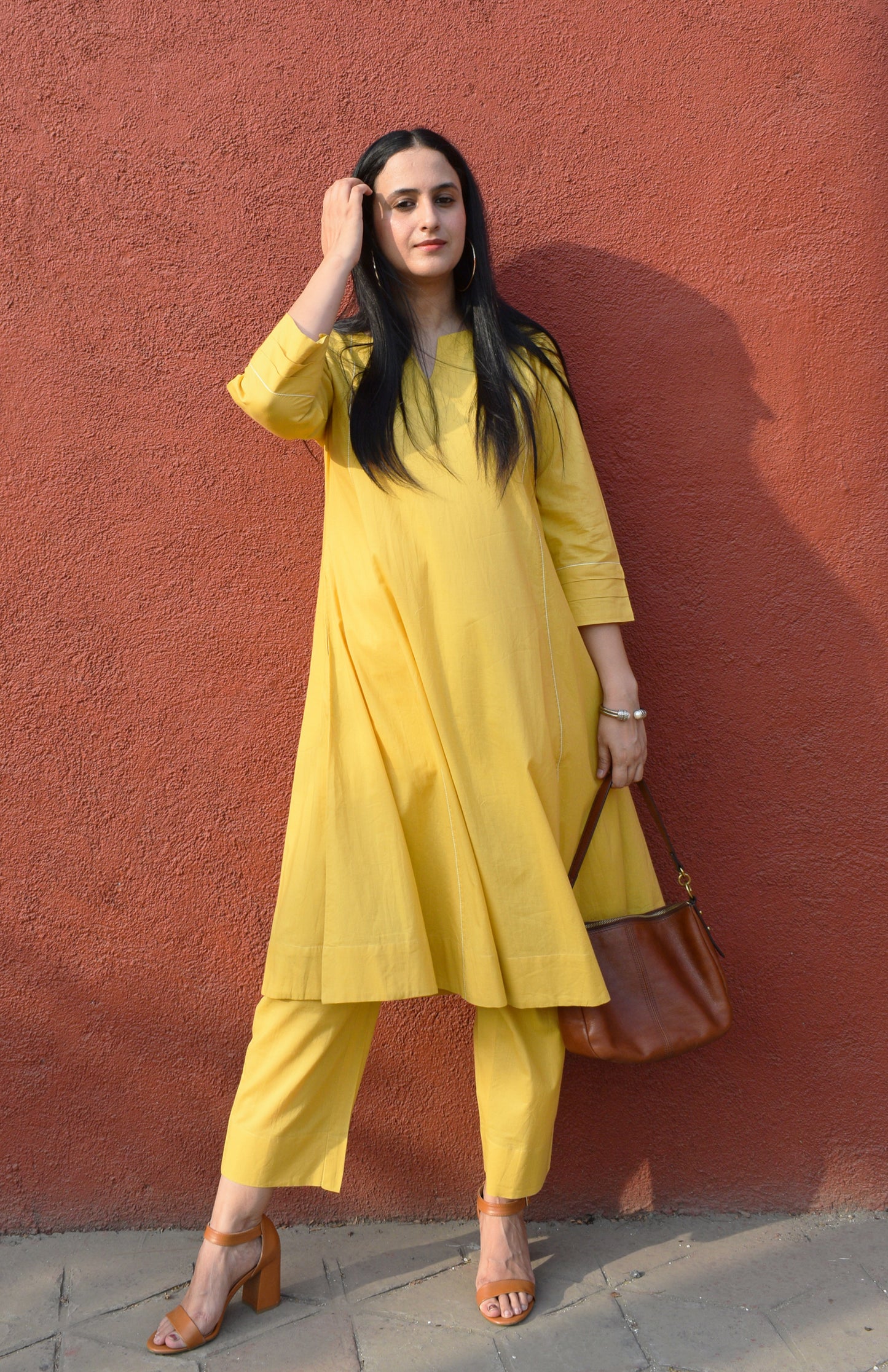 Yellow A line cotton kurta with panels