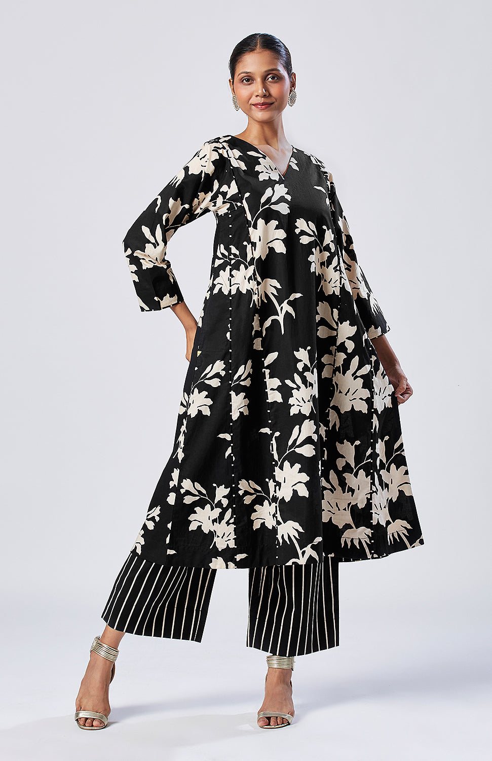 Black floral kurta set with striped pajama