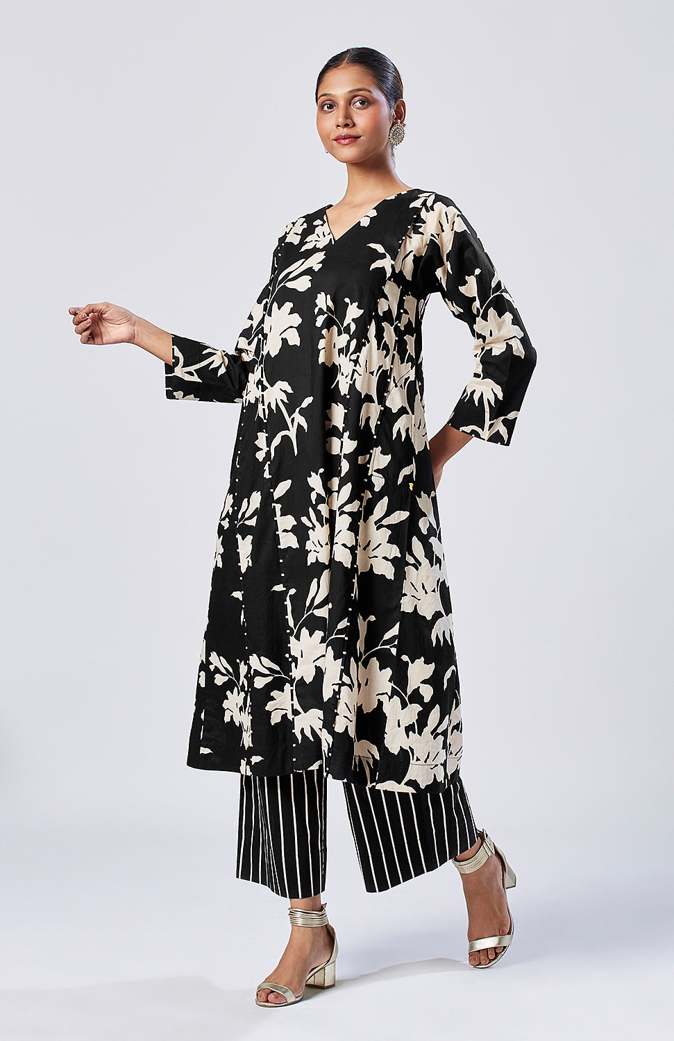 Black floral kurta set with striped pajama