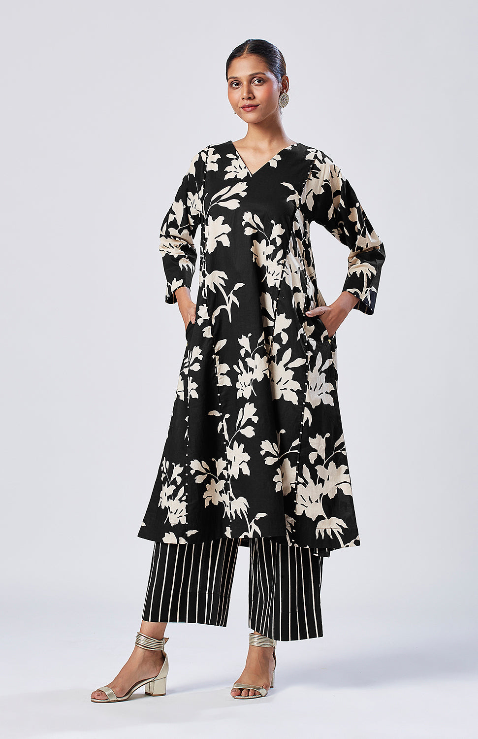 Black floral kurta set with striped pajama