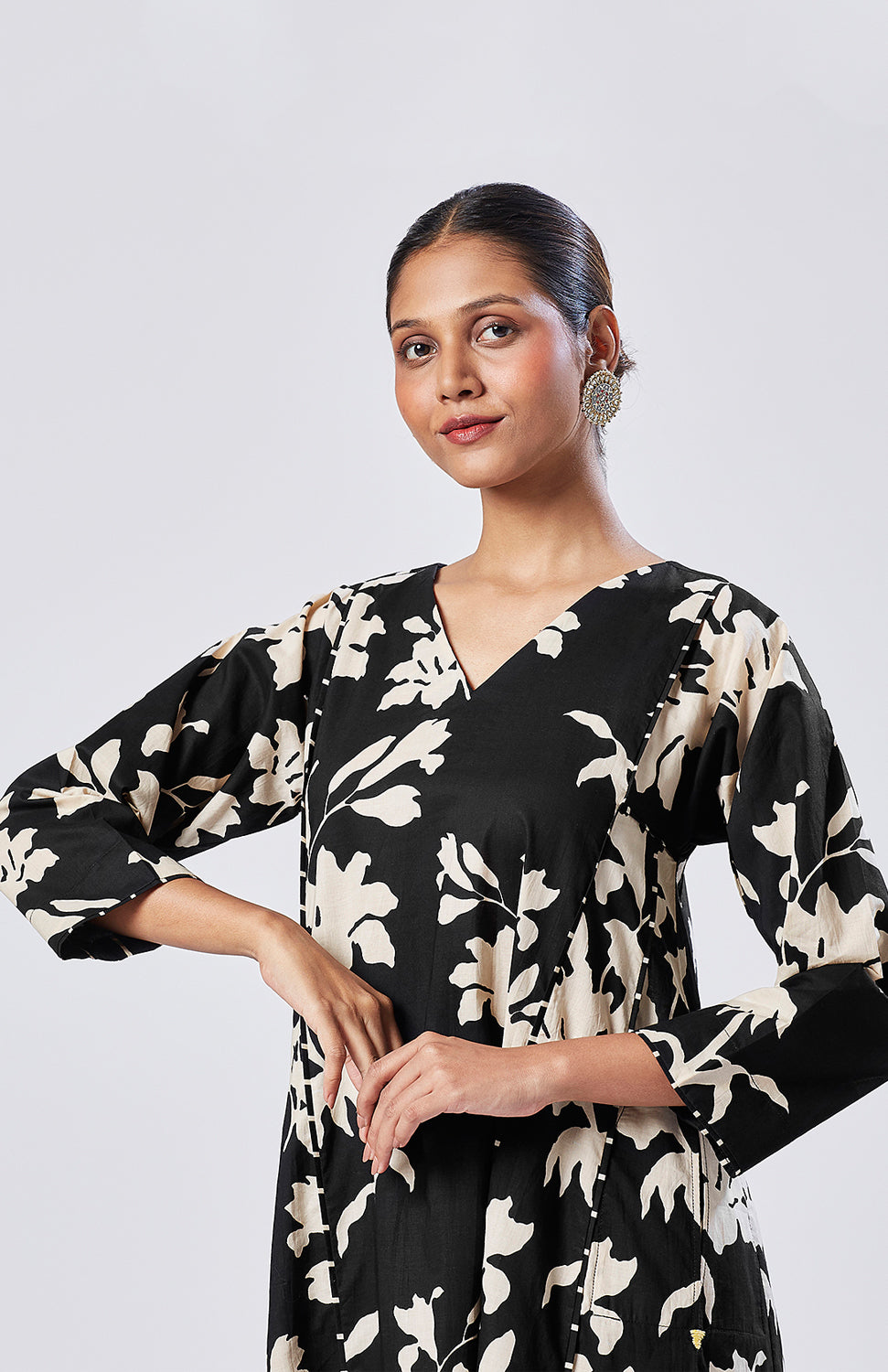 Black floral kurta set with striped pajama