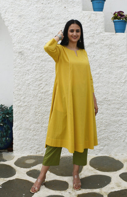 Yellow A line Cotton Kurta with Panels and green pyjama