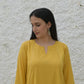 Yellow A line Cotton Kurta with Panels and green pyjama