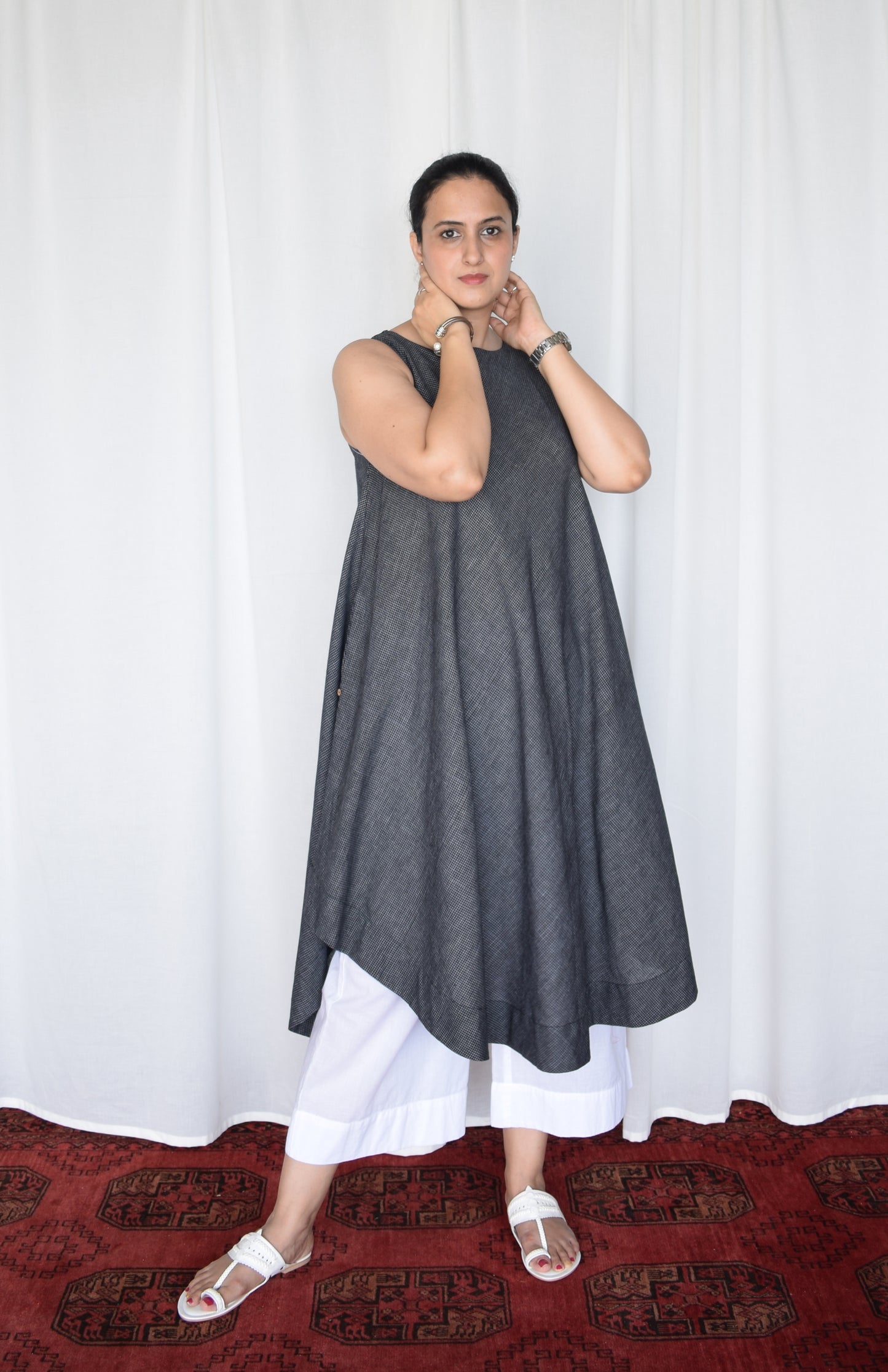 Black sleeveless kurta set in handwoven checks and pyjama