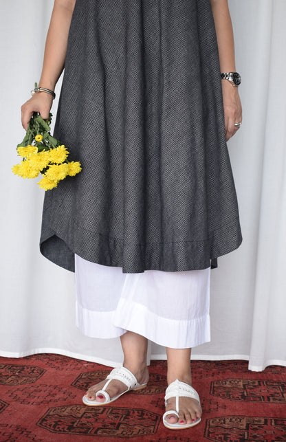 Black sleeveless kurta set in handwoven checks and pyjama