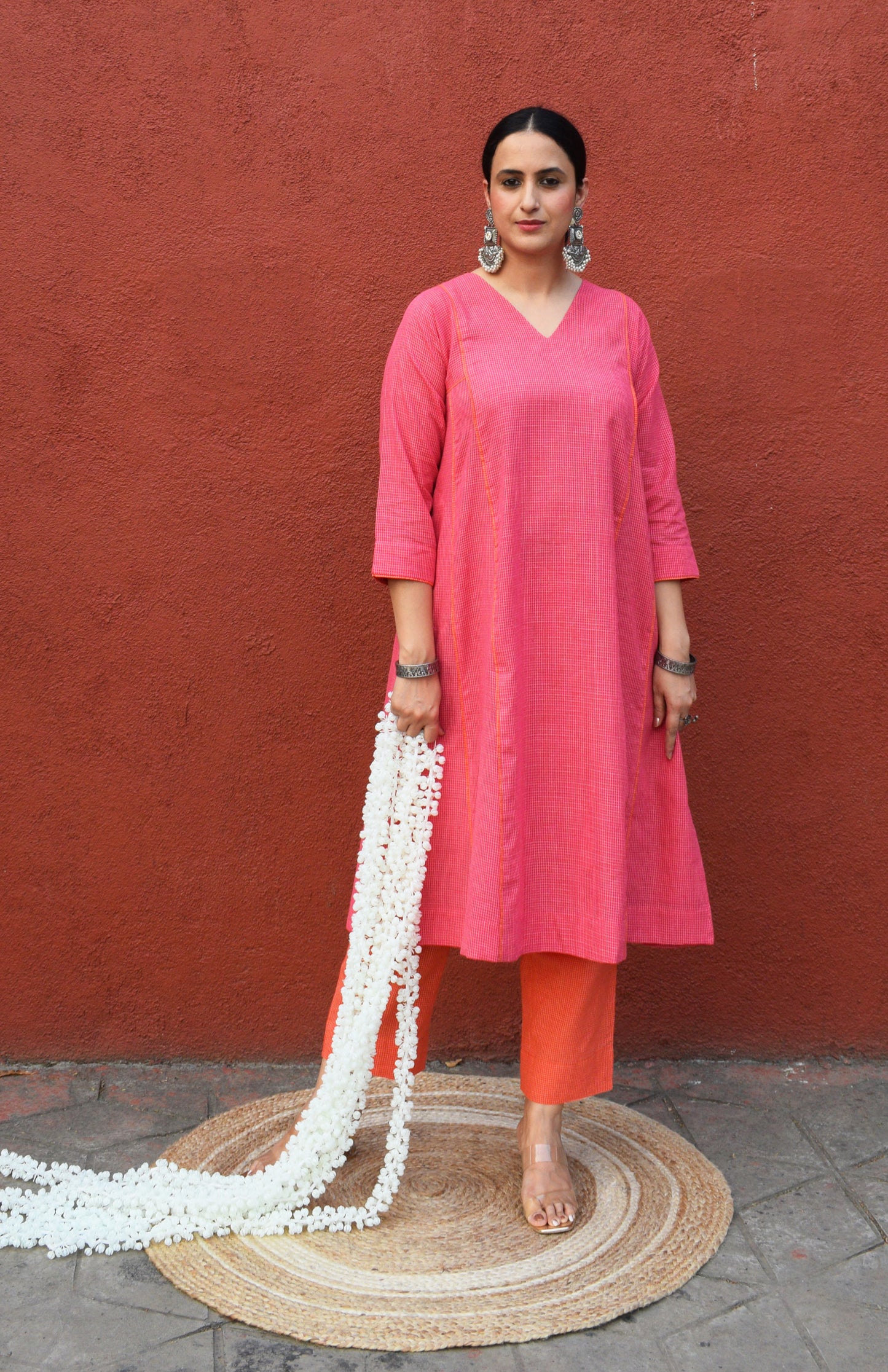 Pink V neck kurta set and Orange pyjama in handwoven checks