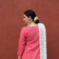 Pink V neck kurta set and Orange pyjama in handwoven checks