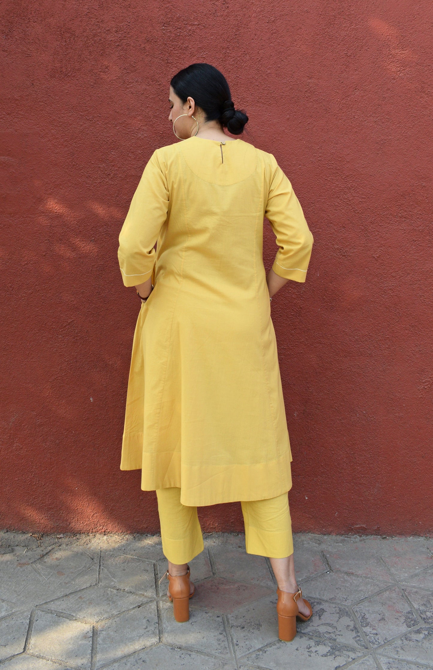 Yellow kurta set with yoke and pyjama