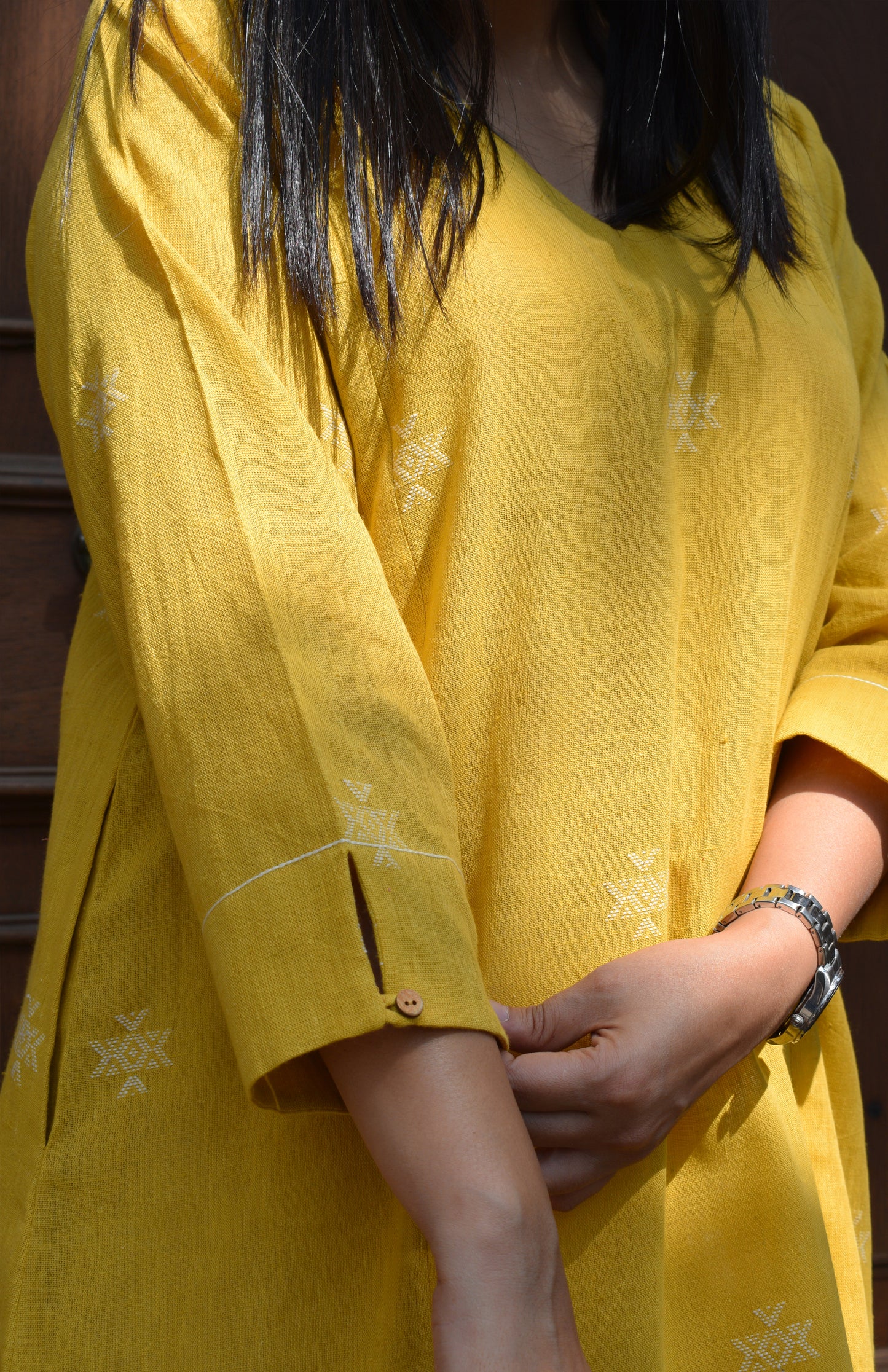 Yellow A line kala cotton kurta with V neck and ivory trousers