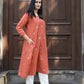 Rust orange A line kala cotton kurta with V neck and ivory trousers
